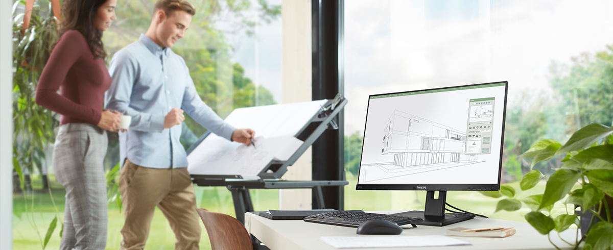 Folk nyder arbejdspladsen med Philips' gr&oslash;nne, milj&oslash;venlige sk&aelig;rme.