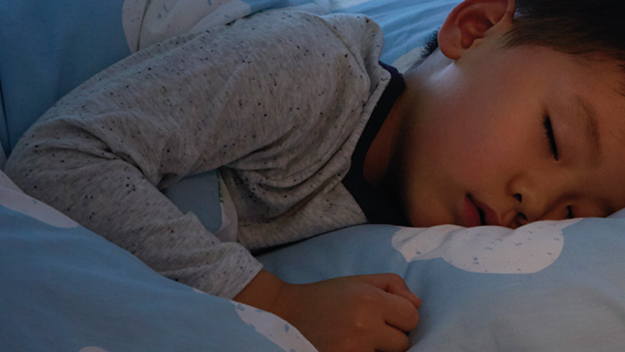 Reduceret st&oslash;jniveau, et sovende barn